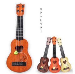 four string children's guitar