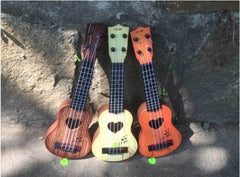 four string children's guitar